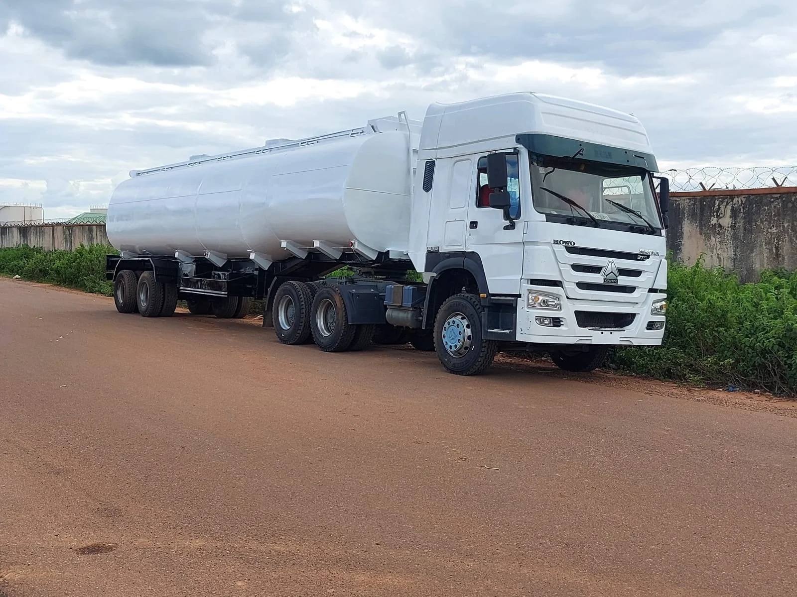 Road tanker truck on highway transporting petroleum products
